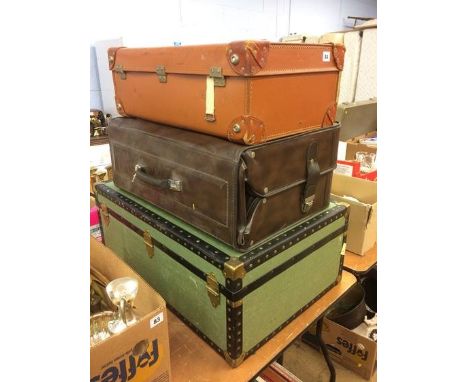Two suitcases and a trunk