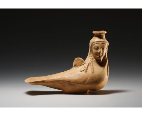 Rhodian 2nd half of the 6th cent. B.C.. Clay. L. 15.7 cm Formed of buff clay, this askos (flask) is in the shape of a siren -