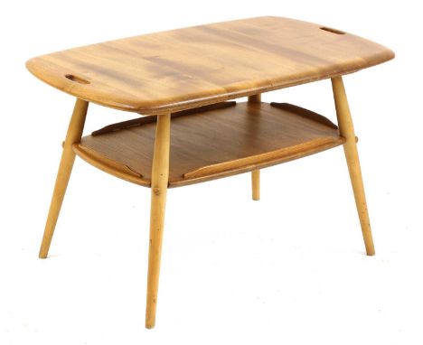 An Ercol butler's table,the shaped top with fret cut handles, an undertier with a gallery, on turned supports, with an Ercol 