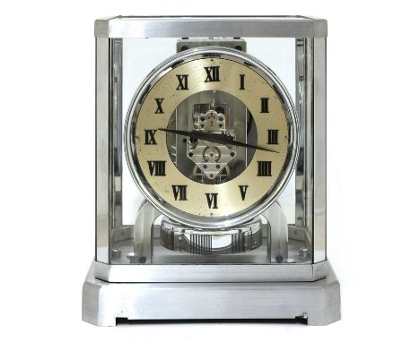 A Jaeger-LeCoultre 'Atmos' clock,528 calibre, no. 7882, in a silvered case, with a bronzed chapter ring with Roman numerals, 
