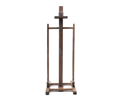 A limed oak artist's easel,in the Heal's style, with an adjustable mechanism,64cm wide66cm deep184cm highCondition report: A 