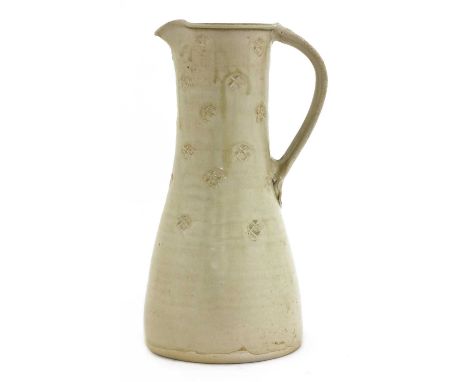 *Jim Malone (b.1946),a stoneware jug, with a tapering body, a cream glaze with impressed details, impressed artist's monogram