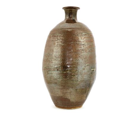 *David Leach (1911-2005),a tall iron-glazed stoneware bottle vase, with incised decoration, with imprinted artist's mark to t