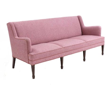 A Danish three-seater sofa,1960s, on stained tapering beech legs, with spade feet, upholstered in purple melange wool fabric,