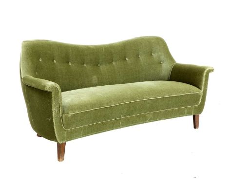 A Danish sofa,1940s, with a swept back, upholstered in green velour with a buttoned back, on stained bowed beech legs,170cm w