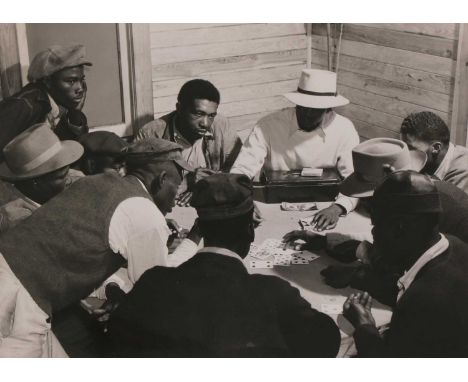 Marion Post Wolcott (American, 1910-1990) Card game of African-American Day Labourers, Belle Glade, Florida, 1941silver gelat