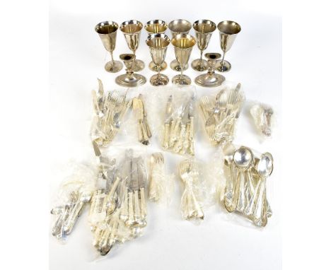 A group of silver plated items including wine goblets, a pair of candlesticks and mixed loose flatware.Additional Information