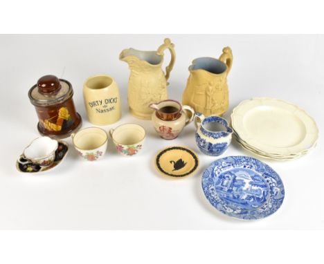 A small group of decorative ceramics including a Queen Caroline copper lustre transfer decorated jug, two Parian jugs, a Roya