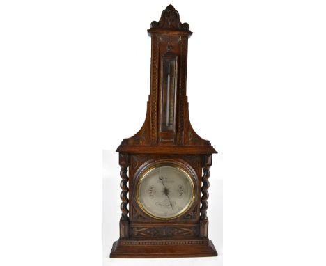 THOMAS ARMSTRONG &amp; BROTHER LTD MANCHESTER, LIVERPOOL &amp; LONDON; an early 20th century oak barometer and thermometer wi