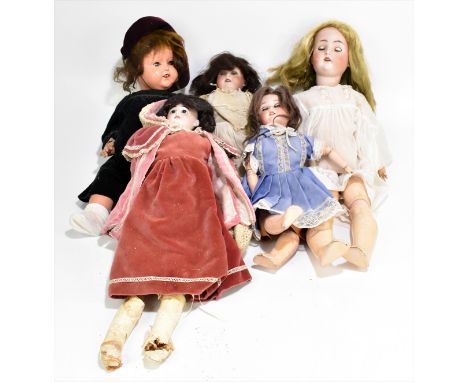 Four bisque headed dolls comprising an Armand Marseille example with brown wig, open/close brown glass eyes, open mouth with 