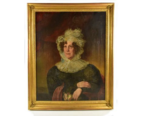 EARLY 19TH CENTURY ENGLISH SCHOOL; oil on canvas, portrait of a woman wearing white lace bonnet and holding a rose, unsigned,