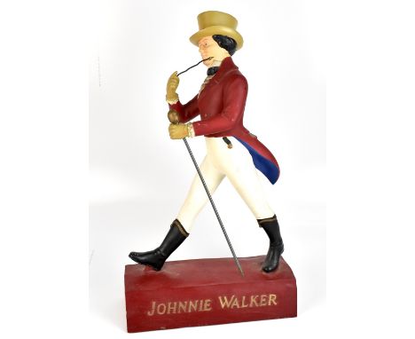 A&nbsp;reproduction Johnnie Walker Scotch Whisky&nbsp;advertising celluloid figure,&nbsp;height 70cm,&nbsp;length 40cm,&nbsp;