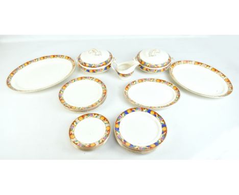 KEELING &amp; CO; a Losol Ware part dinner service comprising three oval platters, a pair of lidded terrines, four dinner pla
