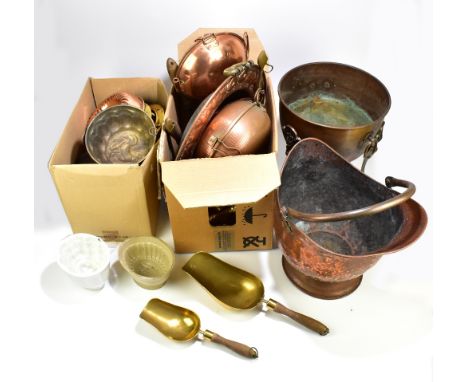 A group of metalware including two brass framed mirrors, pewter tea ware, copper dish and pans, lion head door knocker, coppe