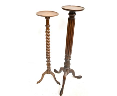 A 19th century mahogany torchere stand raised on tripod supports, height 128cm, and a similar oak barley twist example, heigh