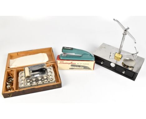 MAW OF LONDON; a cased set of chrome plated balance scales, with a cased printing set.