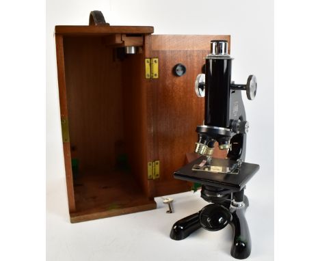 BECK OF LONDON; a mahogany cased 'Model 47' microscope no.32859 with 42mm x6 eyepiece lens and three objective lenses compris