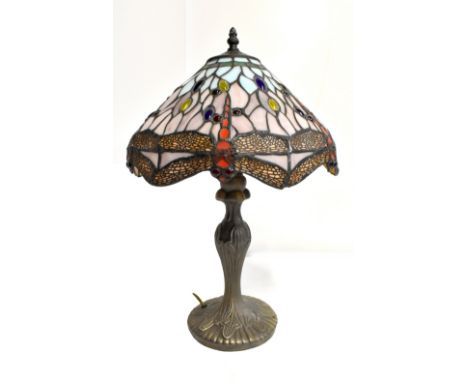 A contemporary gilt metal table lamp with Tiffany-style shade with dragonfly and jewelled decoration, height 49cm.Additional 