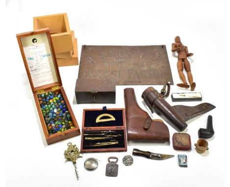 A group of collectors' items including a leather pistol holder, a miniature lay figure, brass hinged box, horn handled Middle