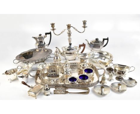 A group of silver plated items including matching tea and coffee pots, further teapot, twin branch candelabrum, asparagus ton