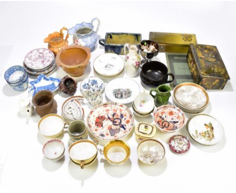 A group of predominantly 19th century ceramics including floral decorated jug, tea bowls and saucers, art pottery planter, et
