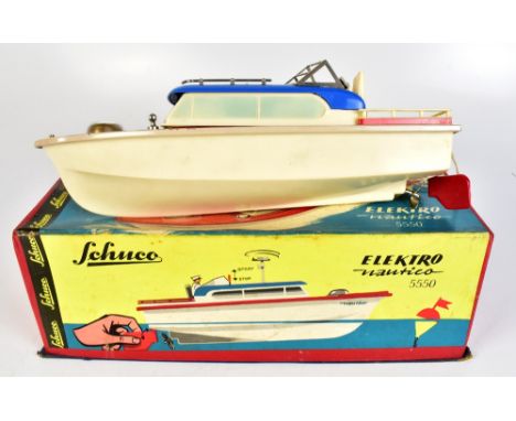 SCHUCO; a boxed 5550 Elektro Nautico model boat with pilot and compass.Additional InformationLight general wear, some surface