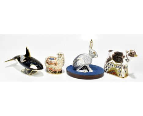 ROYAL CROWN DERBY; four animal form paperweights,&nbsp;comprising 'Fair Isle Orca', 'Imari Ewe', 'Bluebell Calf', and 'Starli