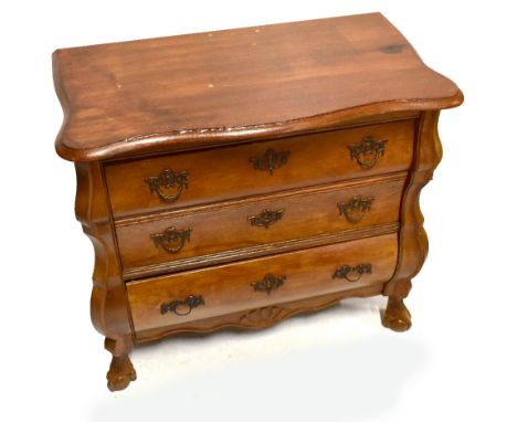 A French style oak serpentine front chest with fall front above a base drawer, on ball and claw feet, width 75cm, depth 41cm,