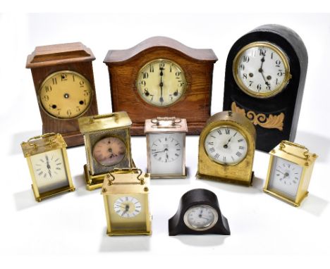 Three mantel clocks including an ebonised domed example with painted gilt detail, a miniature domed mantel clock and five rep