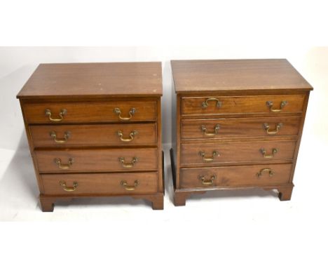 A small pair of mahogany narrow four door chests on bracket feet, height 61cm, length 57.5cm, depth 35.5cm.Additional Informa
