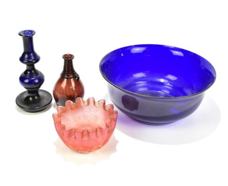 A 19th century blue glass bowl, diameter 25.5cm, a dark blue glass candleholder, height 18.5cm, an amethyst/brown tinted smal