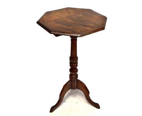 A 19th century tilt-top tripod table with octagonal top, height 72cm, diameter 42cm.Additional InformationSplitting to the un
