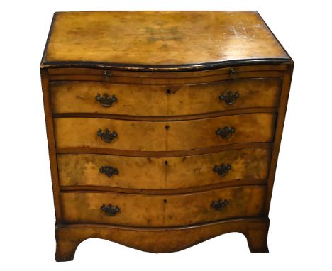 A&nbsp;reproduction burr walnut veneered serpentine front chest, with brushing slide above four drawers on bracket feet,&nbsp