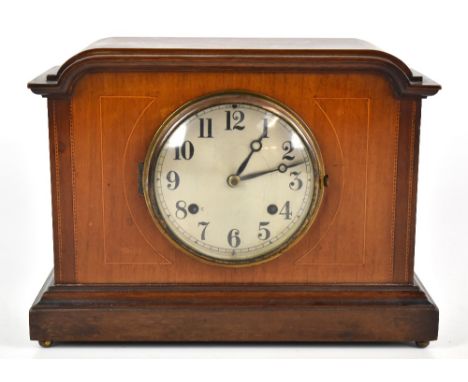 NEWHAVEN USA; an Edwardian mahogany and inlaid eight day mantel clock, the circular silvered dial set with Arabic numerals, t