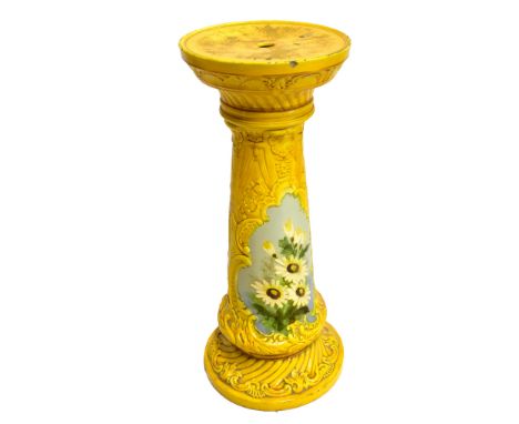 WAROLE; an Arts &amp; Crafts ceramic jardinière stand with tube lined and relief floral detail on a mustard ground, height 67