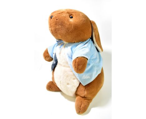 EDEN TOYS; a large plush Peter Rabbit soft toy with signature blue jacket inscribed 'Peter', height 59cm.Additional Informati