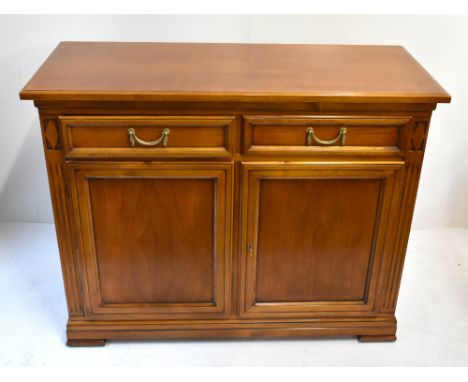 SELVA; a reproduction sideboard with two drawers above pair of panel doors, 116 x 47.5cm.Additional InformationOverall good w