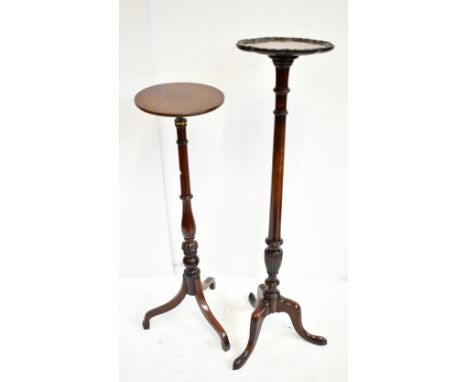 A late 19th century mahogany telescopic stand with circular adjustable top on turned column and boxwood strung tripod support