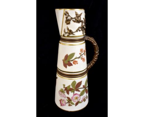 ROYAL WORCESTER; a blush ivory leaf and floral decorated ewer with textured handle and puce mark to base, with printed number