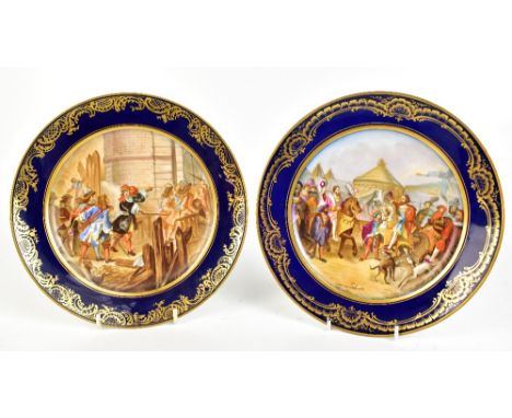 A pair of early 20th century cabinet plates hand painted with figural scenes, the first titled 'Prise de Valence' and the sec