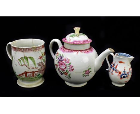 LIVERPOOL; an 18th century porcelain teapot and cover with painted enamel and floral sprays, height 15cm, a mug decorated in 