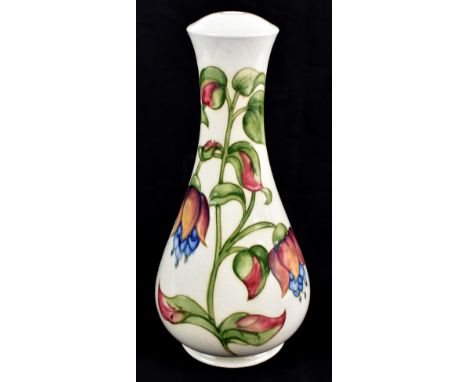 WALTER MOORCROFT; a baluster table lamp decorated in the 'Fuchsia' pattern, blue printed marks and original label to base, he