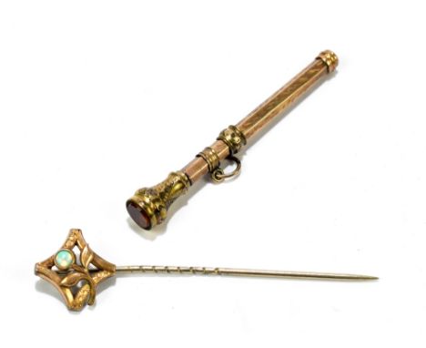 A gold plated propelling toothpick, length 5cm and a stick pin, length 5.2cm.Additional InformationNeither are precious metal