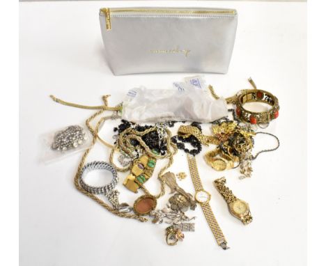 A quantity of assorted costume jewellery to include a cameo brooch, various fashion watches, filigree brooch, a sterling silv