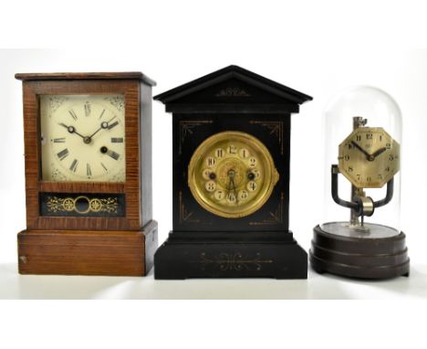 BULLE; an electric mantel clock with applied octagonal dial set with Arabic numerals and raised on Bakelite base, height 28cm