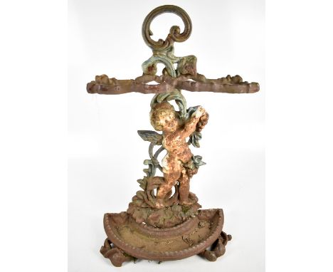 A reproduction cast iron two division stick stand modelled as a cherub, with floral decoration, height 65cm.Additional Inform