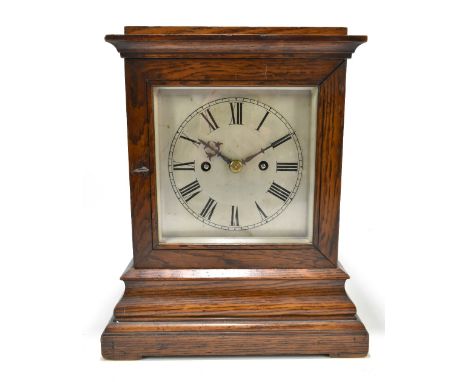 WINTERHALDER &amp; HOFFMEIER; a 19th century oak cased four glass quarter chiming mantel clock, the silvered dial set with Ro
