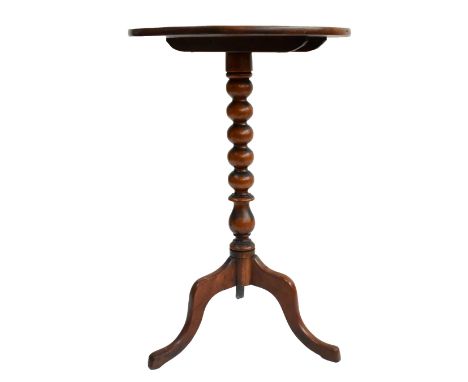 A Victorian mahogany tilt-top occasional table on tripod supports, height 67cm.&nbsp;Additional InformationGeneral wear, scra