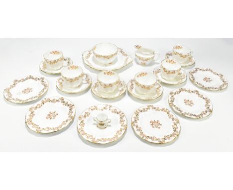 ROYAL CROWN DERBY; twenty one part service decorated with floral sprays in the Imari palette, together with a miniature lovin