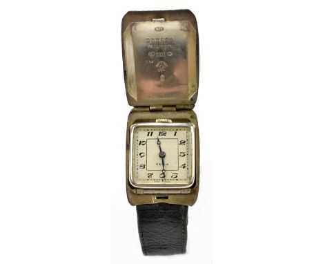 TEXA; a gentleman's sterling silver wristwatch, the outer case with engine turned detail enclosing a square body with Arabic 